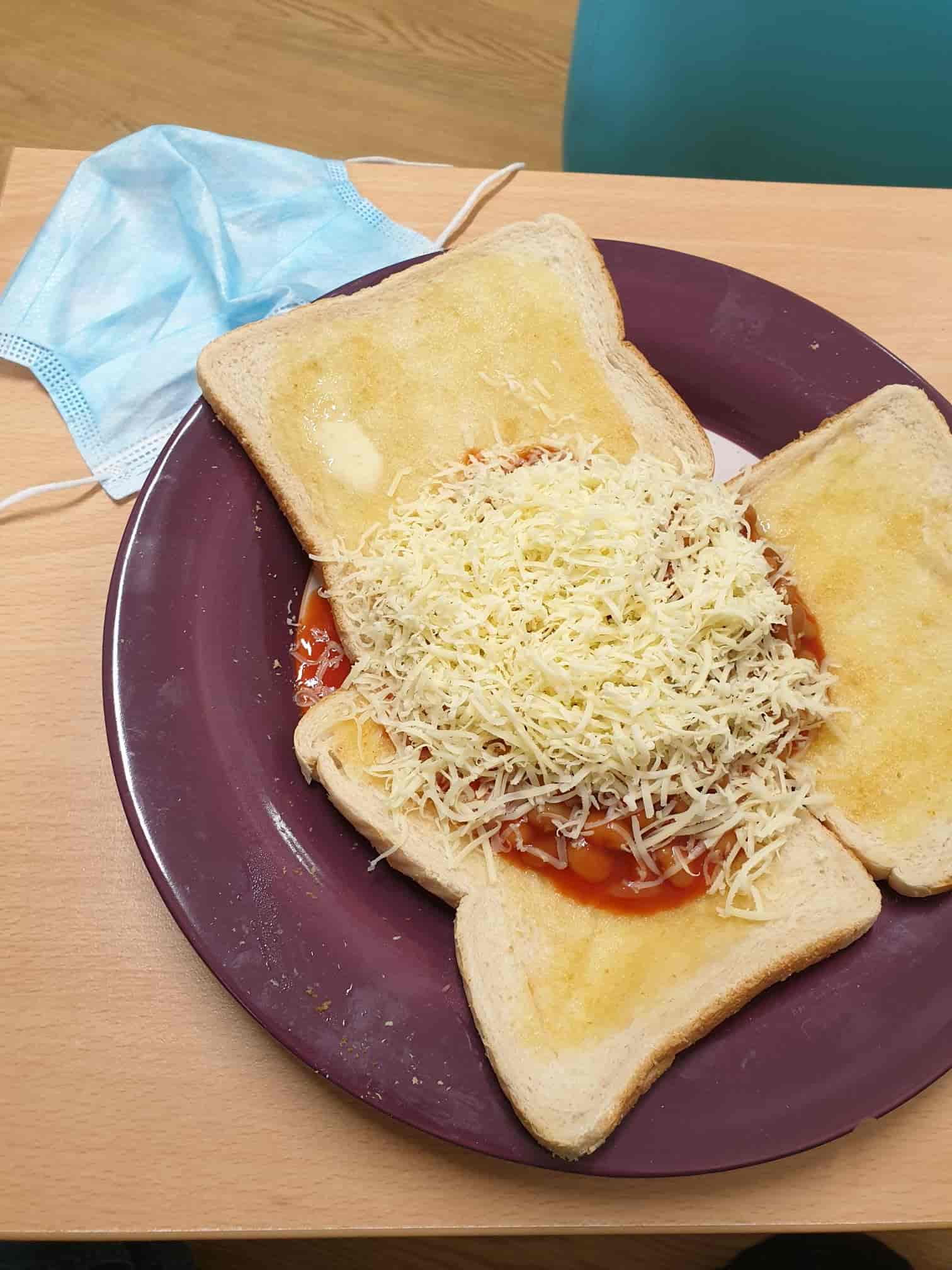 beans on toast covered in cheese
